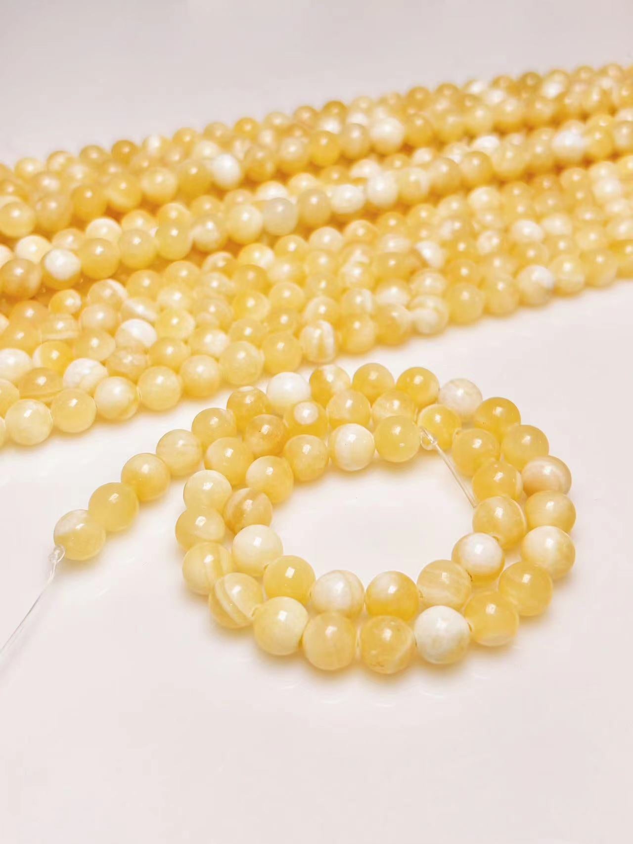 8mm Yellow calcite beads strand